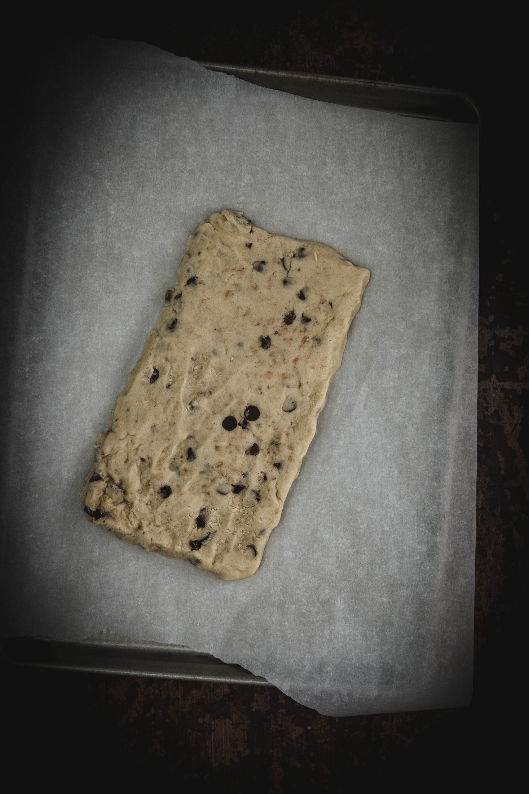 gluten free biscotti dough on parchment paper