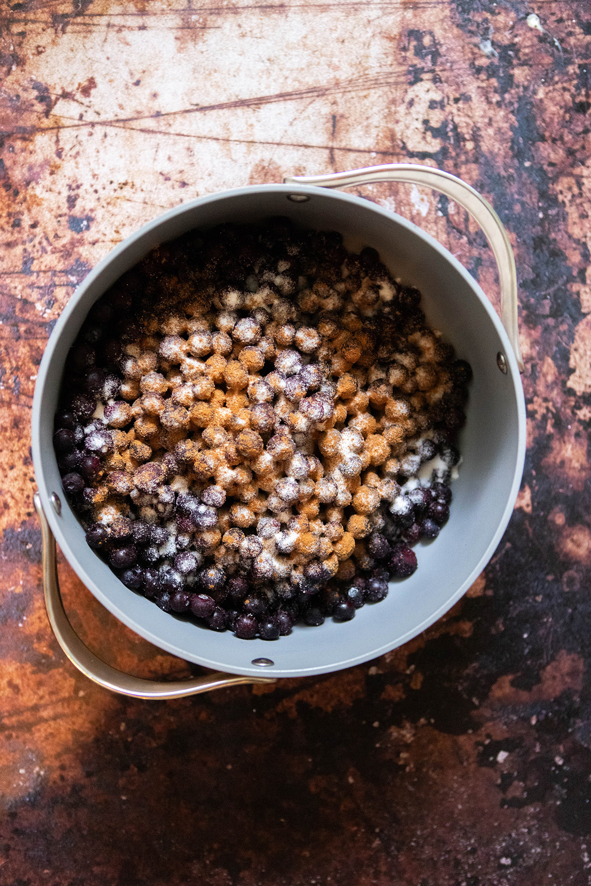 blueberries in a pot with spices for Blueberry Pie with Frozen Blueberries: Easy Homemade Pie