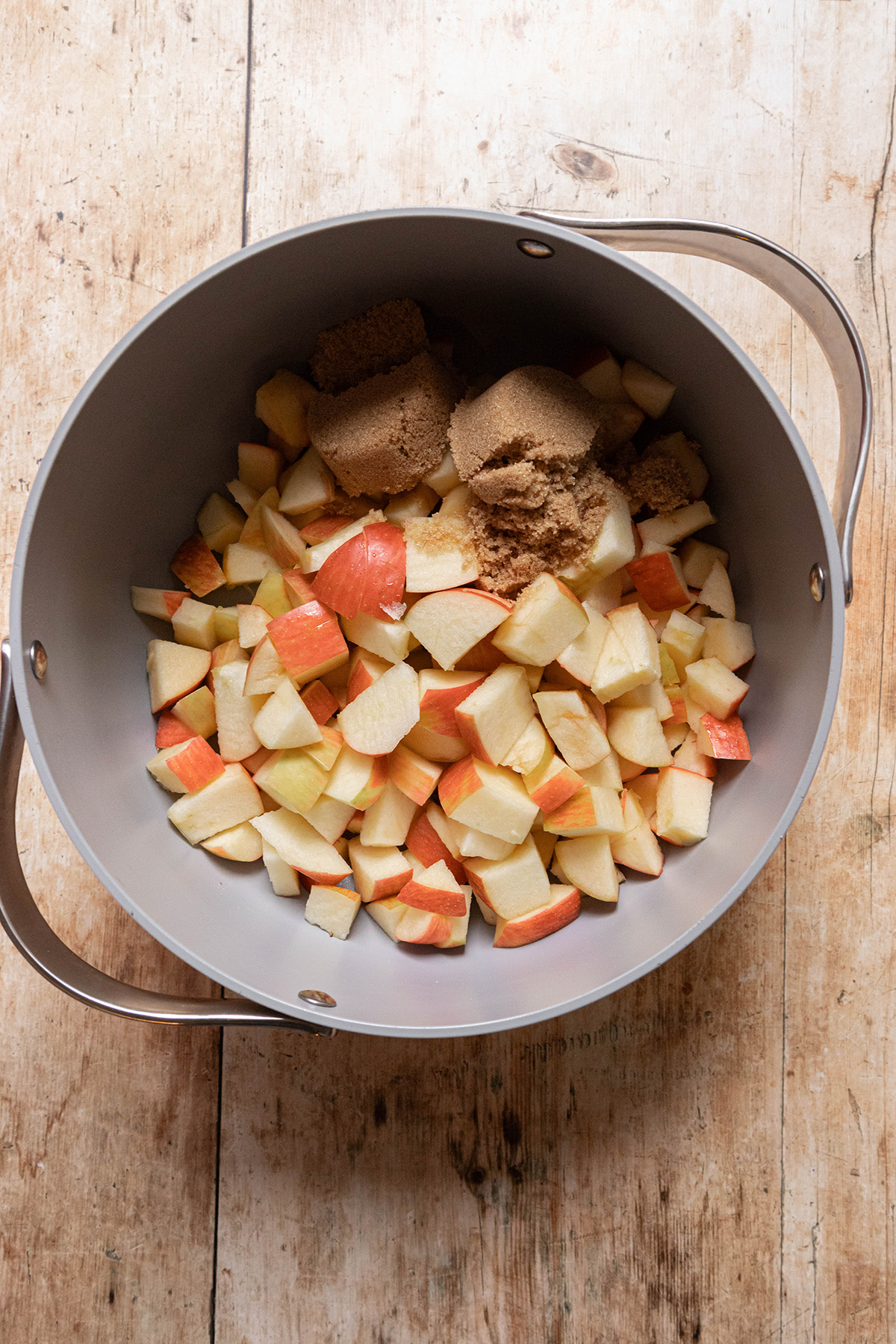 diced apples and brown sugar in a pot