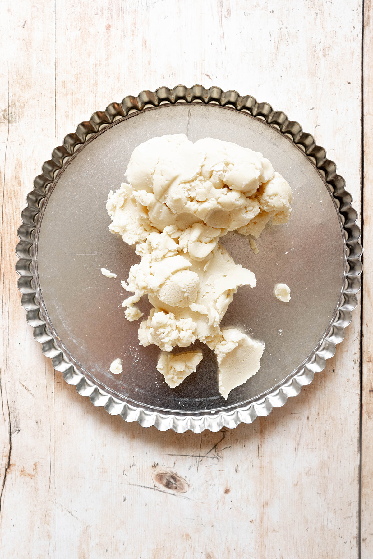 Gluten Free Tart Crust dough in a tart pan 