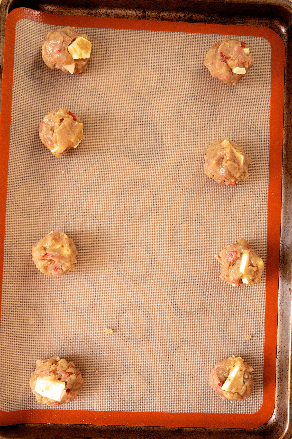 The Best Strawberry White Chocolate Cookies dough on baking sheet