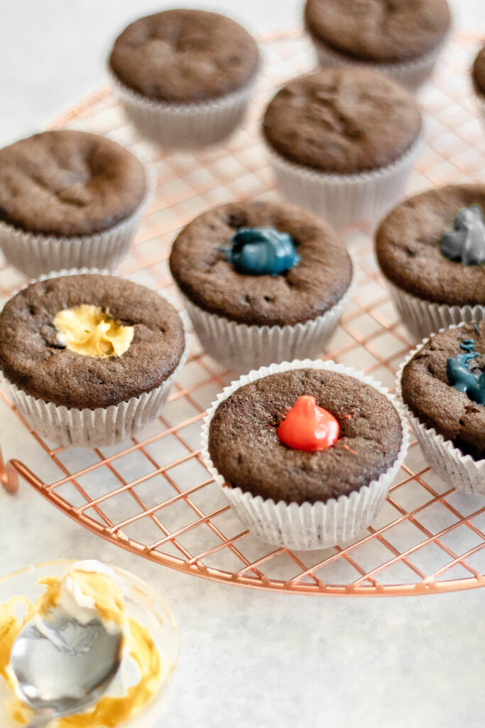 chocolate cupcakes on a brass tray