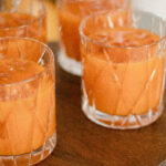 Harry Potter Pumpkin Juice in clear classes on a cake stand