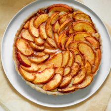 Gluten Free Peach Frangipane Tart on a plate