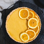 orange tart cover with sliced oranged