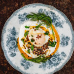 çibir: Turkish poached eggs on a blue and white china plate